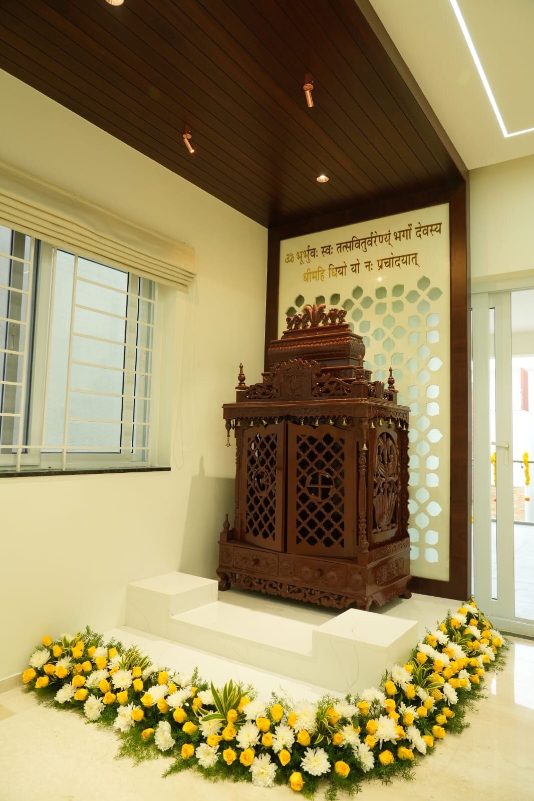Luxury bedroom with marble feature wall and mirrored accents