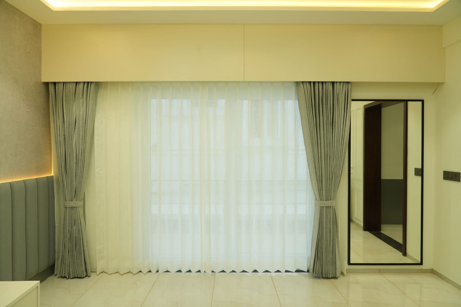 Contemporary study room with pastel cabinetry and integrated workspace