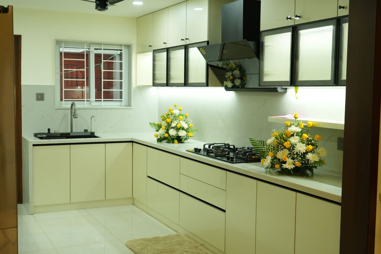 Modern kitchen with sleek appliances and elegant backsplash design